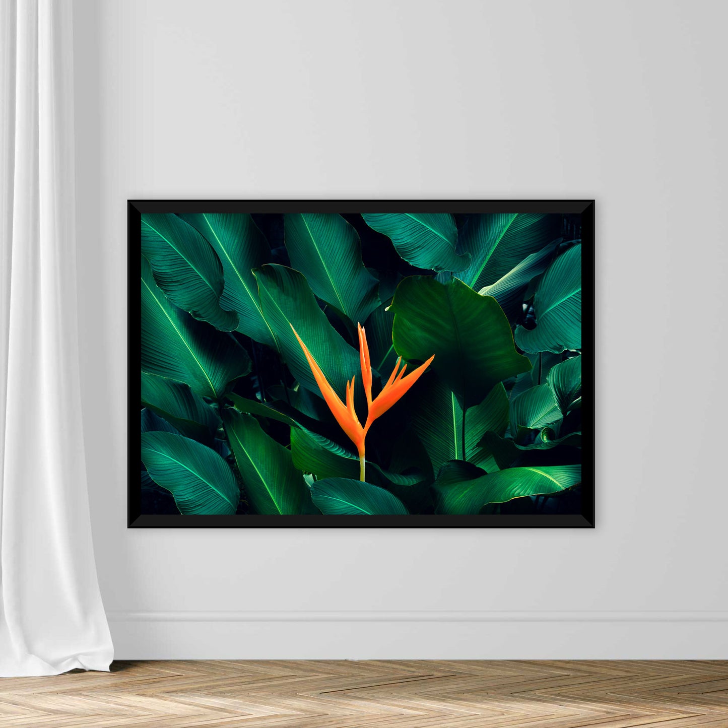 Tropical leaves colorful flower on dark tropical foliage nature background dark green foliage nature