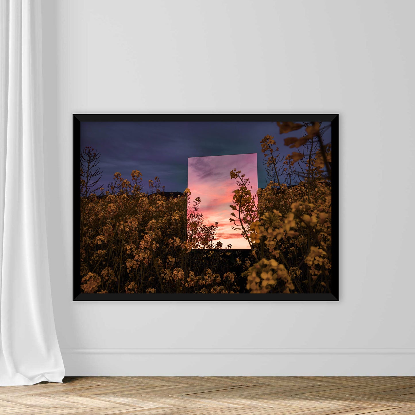 Creative picture of square mirror reflecting dramatic sunset landscape in the nature