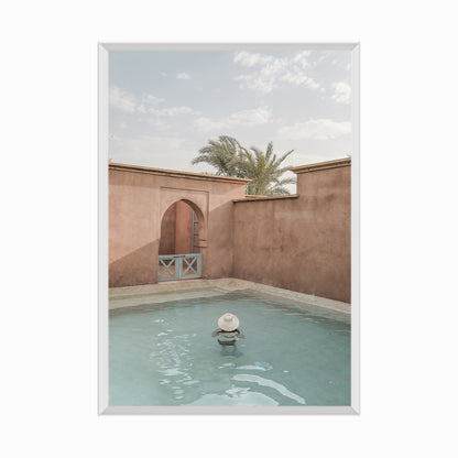 High Angle View Of Woman Swimming In Pool