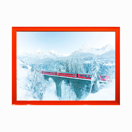 Bernina Express train in white winter snowy landscape