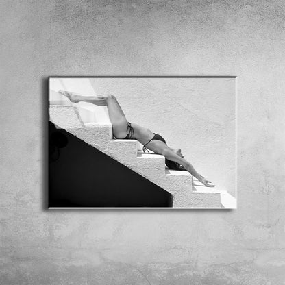 Low Angle View Of Woman On Steps Against Wall