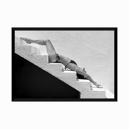 Low Angle View Of Woman On Steps Against Wall